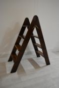 A mahogany set of folding library steps. H.89.5 W.77 D.39.5cm