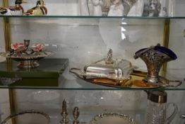 A collection including; a silver plated plate from Harrods with box, a candlestick with flower