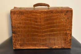 A vintage leather crocodile skin effect suitcase with silk lined interior. H.37 W.57.5 D.18cm