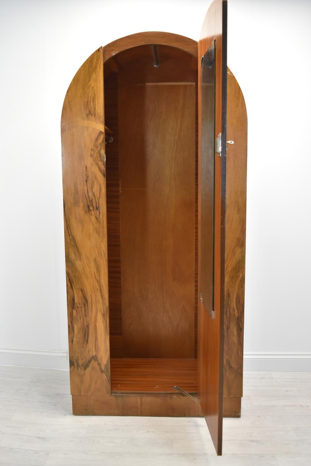 An Art Deco walnut veneered dome topped and twin door wardrobe, opening to reveal mirror, raised - Image 3 of 15