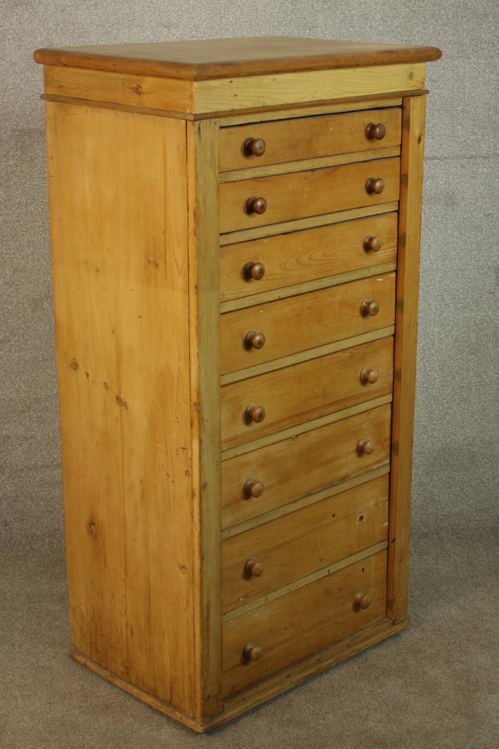 A C19th pine Wellington chest with locking stile, the eight graduated drawers with knob handles. H. - Image 2 of 6