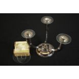 An Austrian sterling silver three branch horn design candelabra with a box of glass plates.