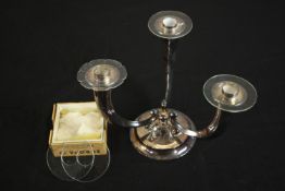 An Austrian sterling silver three branch horn design candelabra with a box of glass plates.