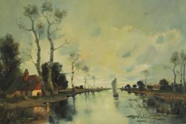 A framed oil on canvas, river scene with cottage and sailing boat, signed A. Fischer. H.70 W.86cm.