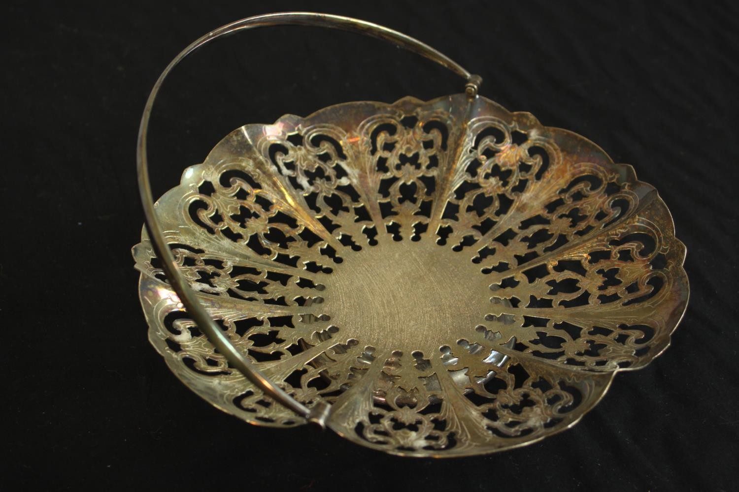 A silver plated chamber stick with snuffer along with a pierced silver plated basket. H.5 Dia. - Image 3 of 10