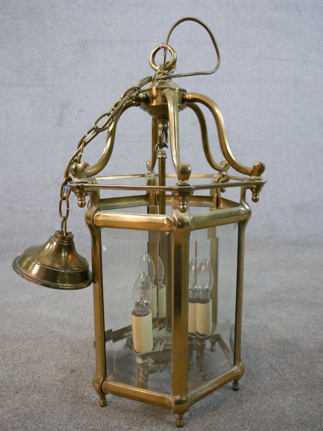 A 20th century brass framed and bevelled glass hexagonal hall lantern. H.56 W.37 D.37cm - Image 4 of 5