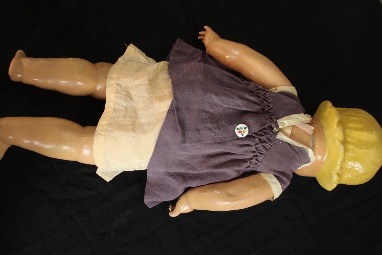 A late 19th century-early 20th century painted papier mache doll with glass eyes and voice box. (not - Image 8 of 9