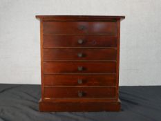 A 19th century mahogany collectors chest with six cork lined drawers. Drawers contain various