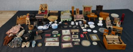 A collection of 80 plus pieces of 19th and 20th dolls house furniture and accessories, including