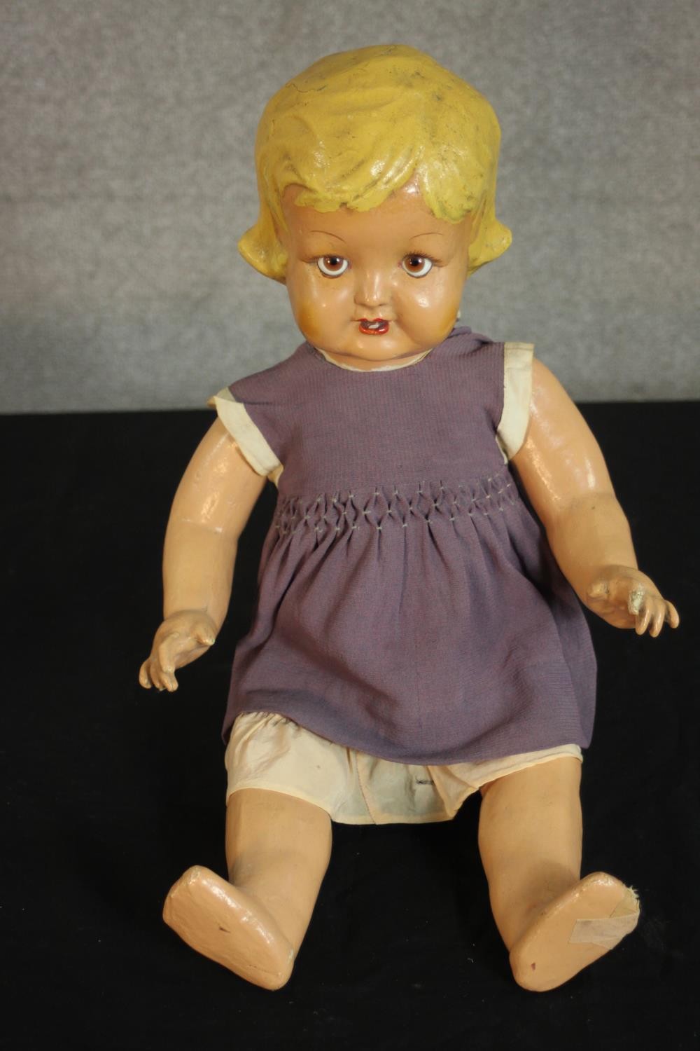 A late 19th century-early 20th century painted papier mache doll with glass eyes and voice box. (not - Image 6 of 9