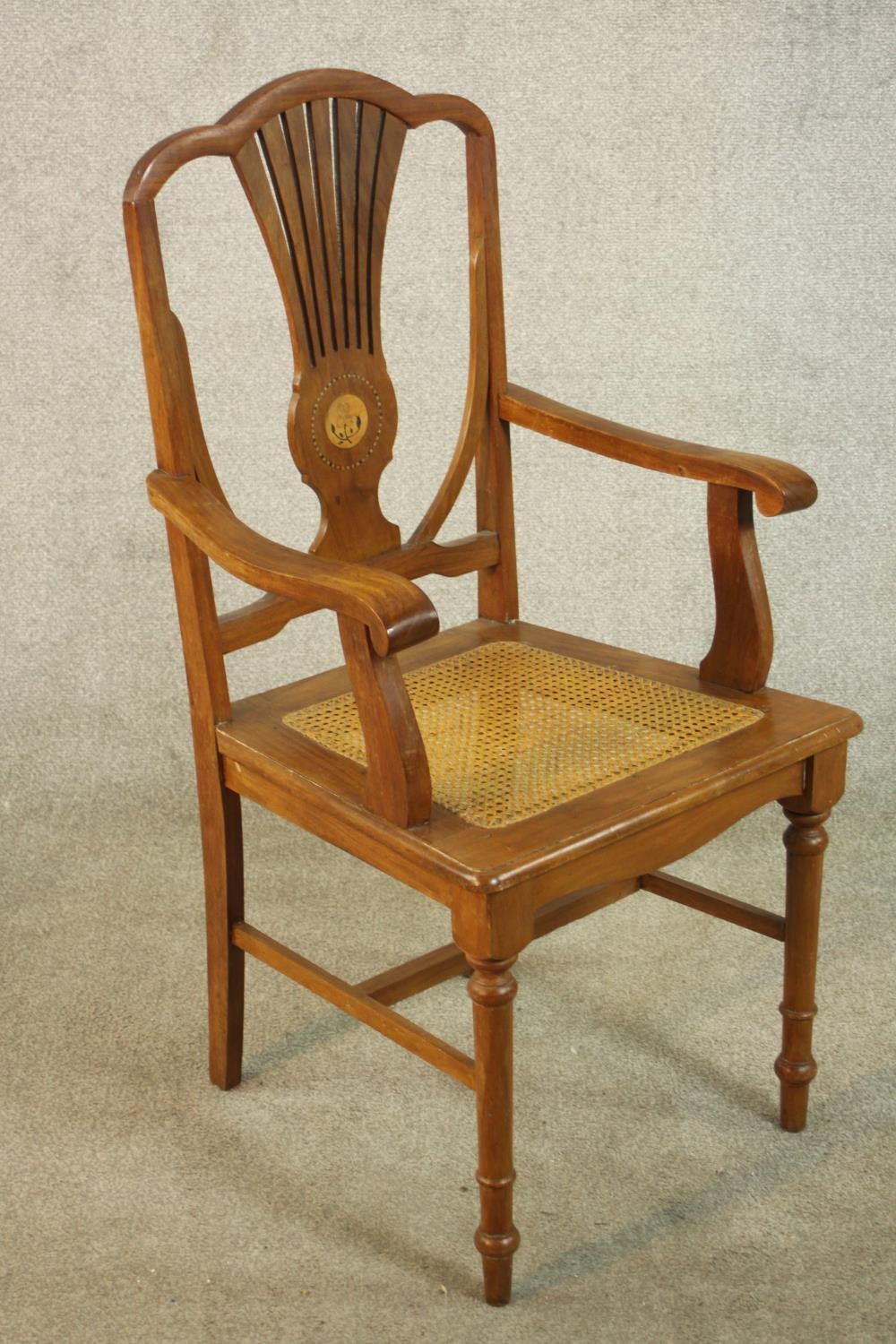 An early 20th century walnut and marquetry inlaid armchair, with a pierced splat back over a caned - Image 2 of 8
