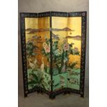 A contemporary Chinese black lacquered, gilded and painted four fold screen, decorated to one side
