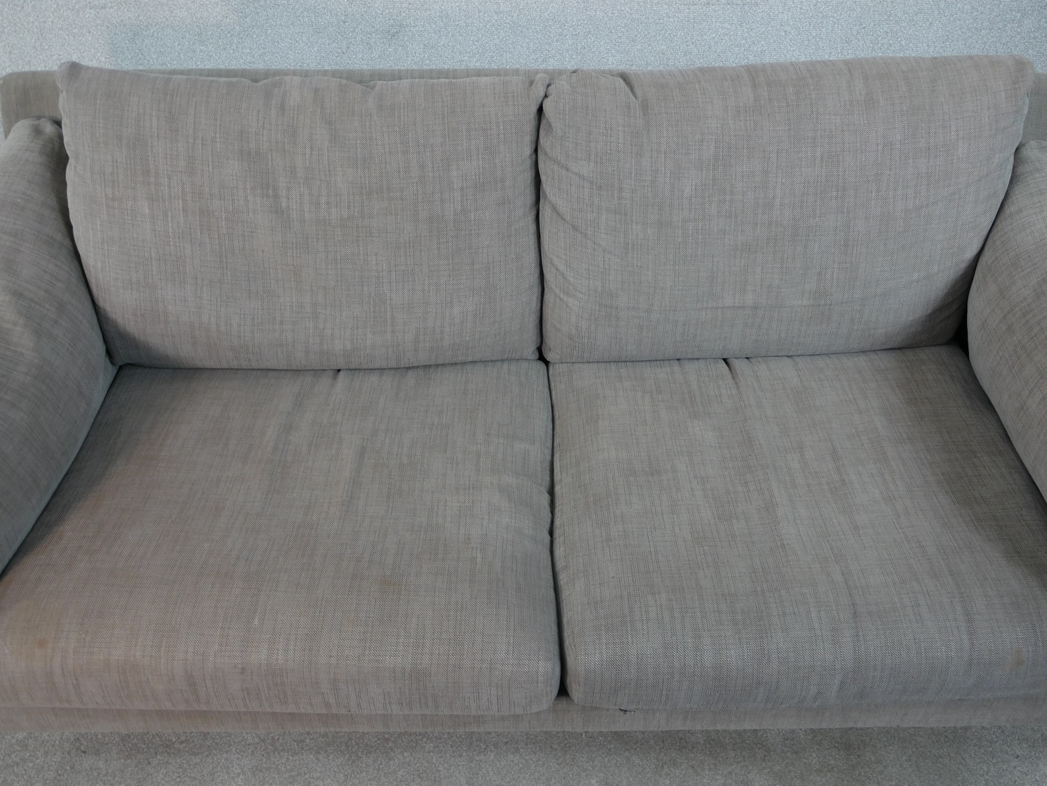 A John Lewis two seater sofa, upholstered in grey fabric, with oak arms and legs. H.77 W.192 D.88cm - Image 6 of 8