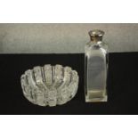 A heavy hand cut crystal fruit bowl along with an Atlantis crystal decanter with silver collar. (