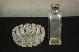 A heavy hand cut crystal fruit bowl along with an Atlantis crystal decanter with silver collar. (