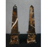 A pair of black marble obelisks of typical form. H.56 W.14 D.14cm