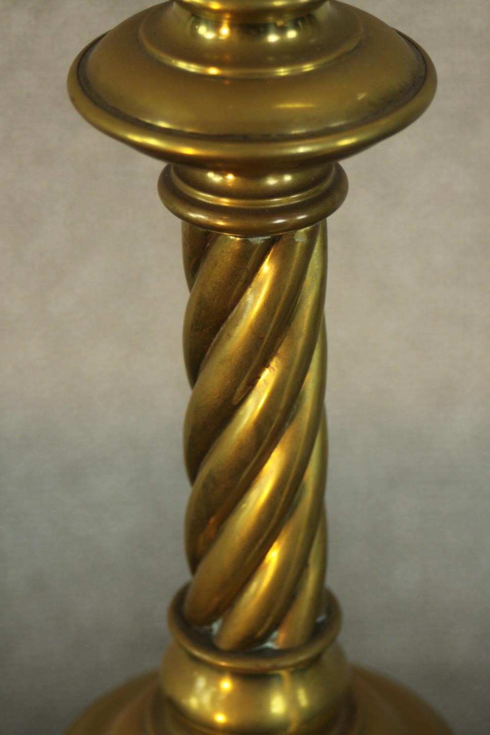 A pair of large early 20th century brass ecclesiastical twist stem floor standing candle holders - Image 4 of 5