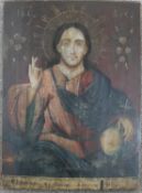 A 19th century Russian Orthodox religious icon on panel, depicting Christ with orb, with cyrillic