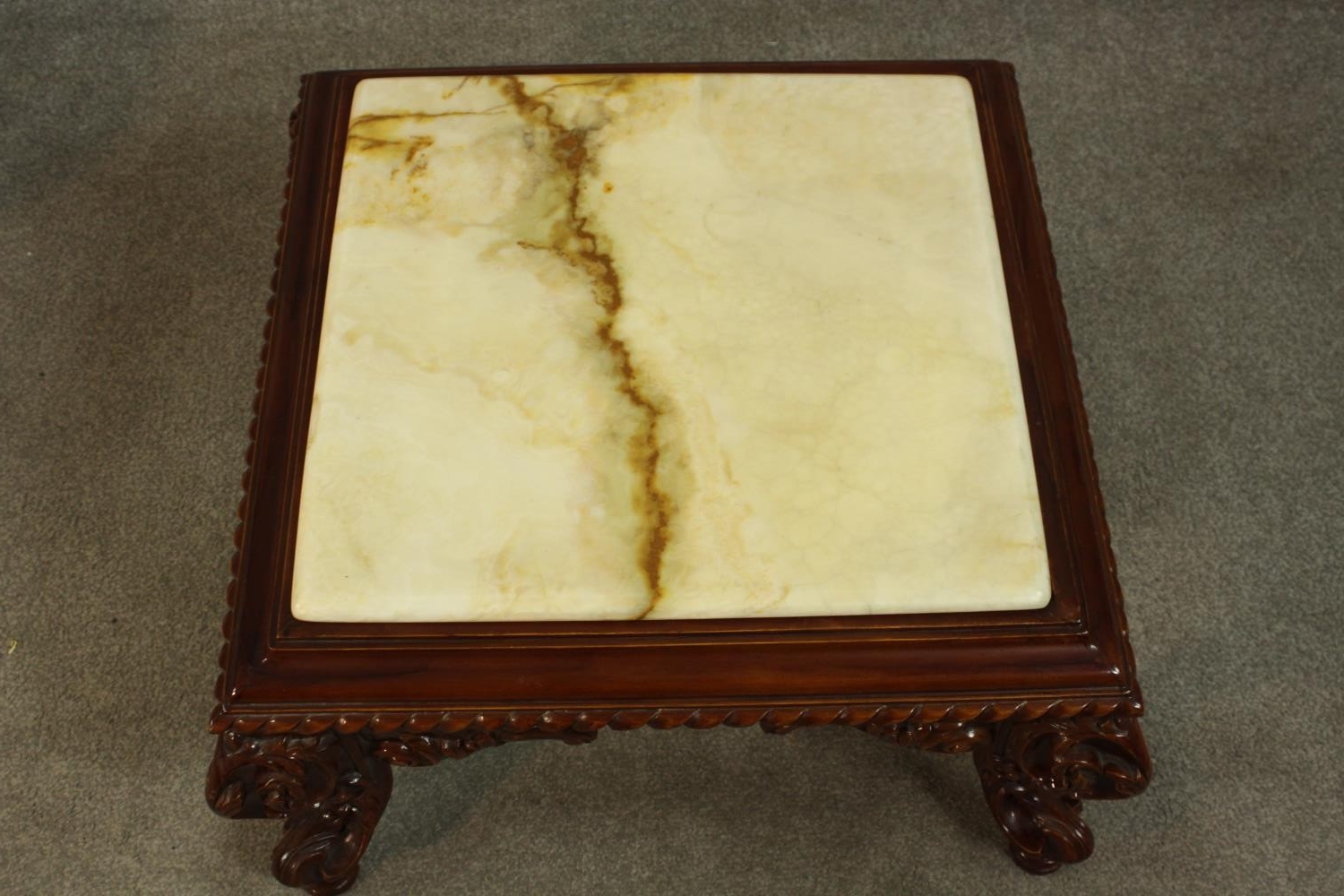 A pair of late 20th century carved hardwood low side tables, with a square onyx top and a - Image 3 of 6