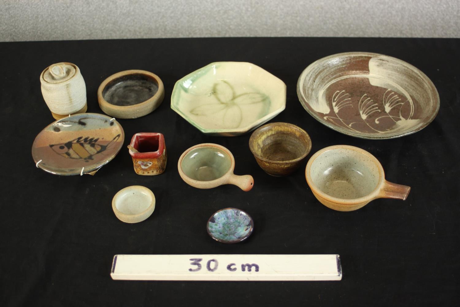 A collection of ten art pottery dishes and small bowls of various forms hand glazed with different - Image 2 of 8