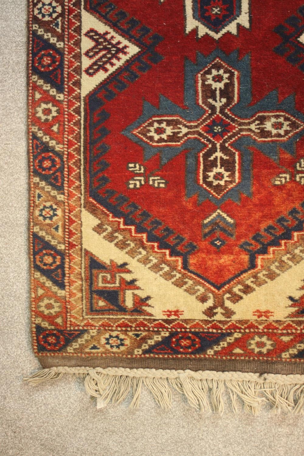 A hand made red ground Turkish Dosemealti runner. L.280 W.77cm - Image 4 of 5