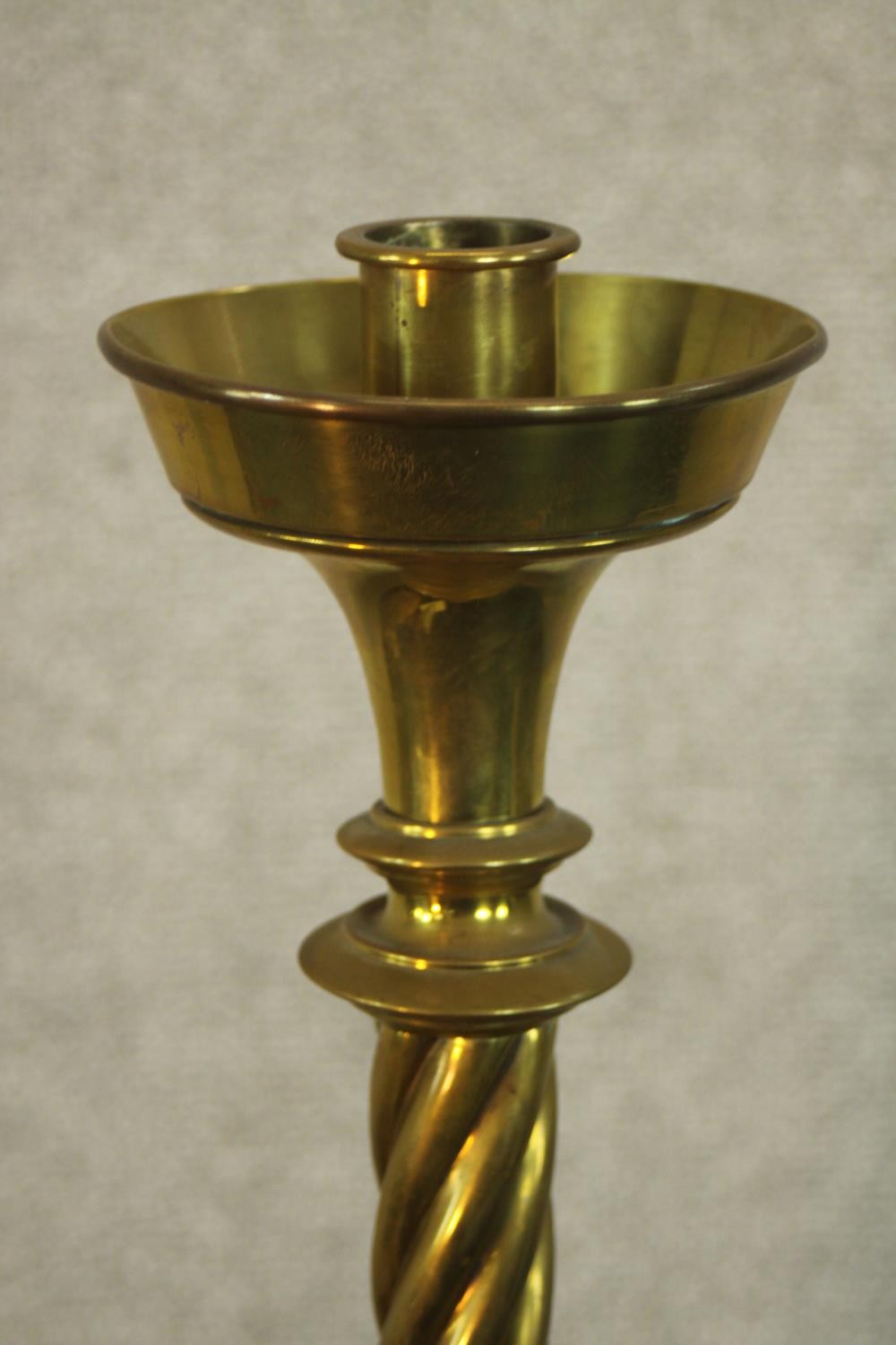 A pair of large early 20th century brass ecclesiastical twist stem floor standing candle holders - Image 3 of 5