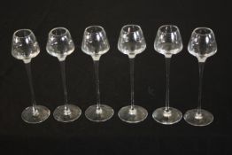 A set of six tall stemmed grappa glasses, signed to base. H.23 Dia.8cm. (each)