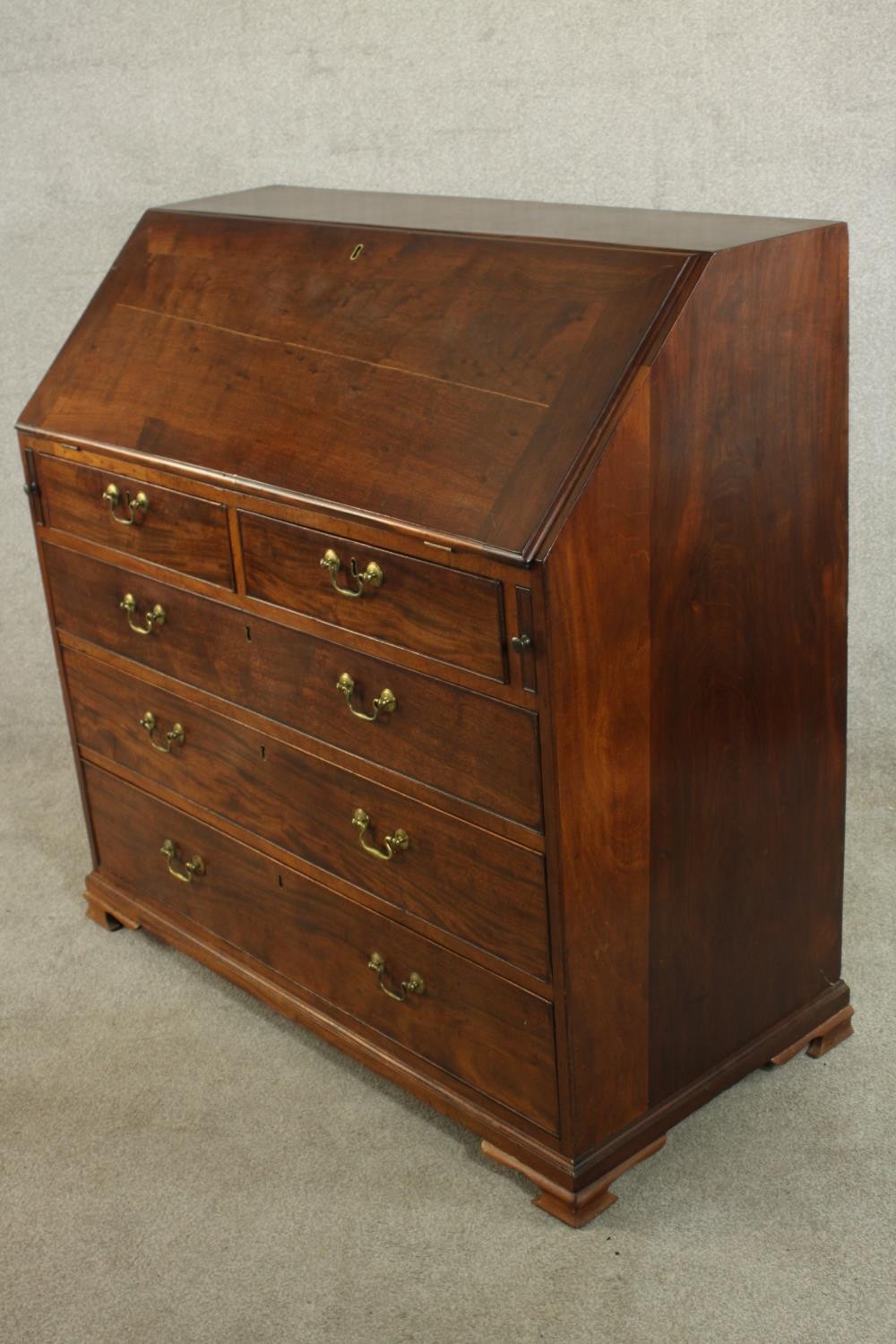 A 19th century mahogany bureau, the fall front enclosing a green writing surface with an arrangement - Image 4 of 12