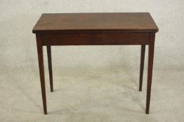 A 19th century mahogany foldover card table, of rectangular form, the interior with green baize,