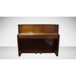 An Art Deco mahogany cased Ritz Model small upright piano, with a cast iron frame. H.101 W.132 D.