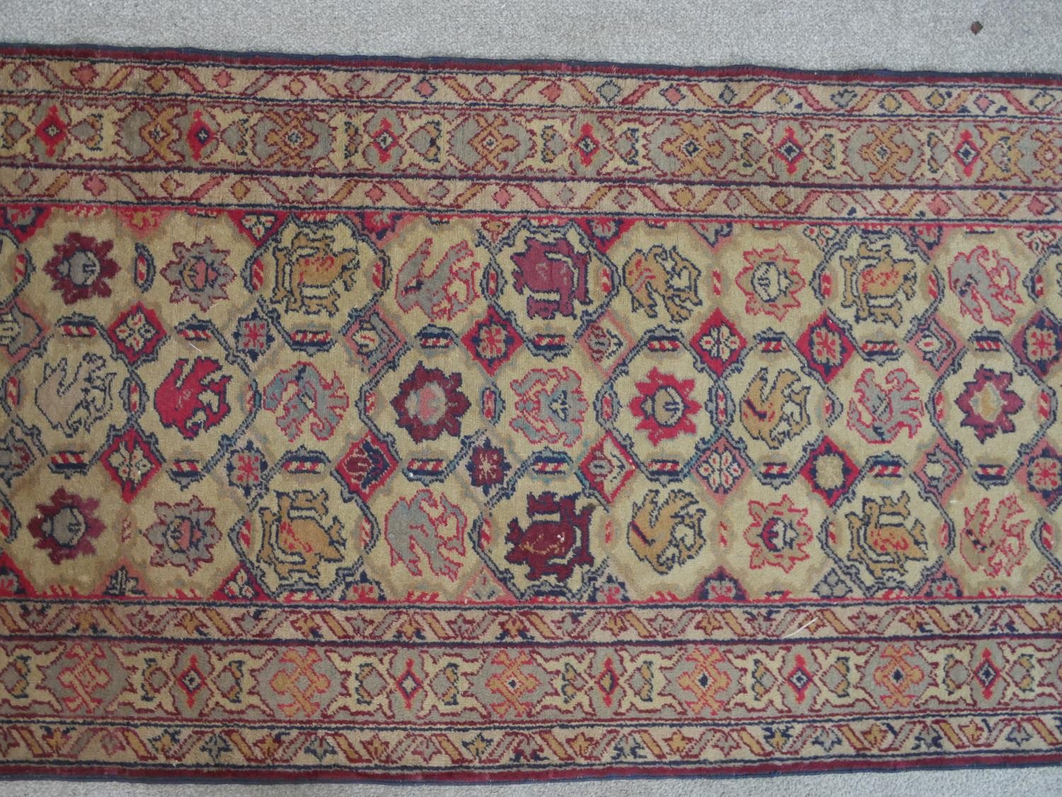 A biscuit ground hand made Erevan Russian runner. W.303 D.82cm - Image 3 of 6