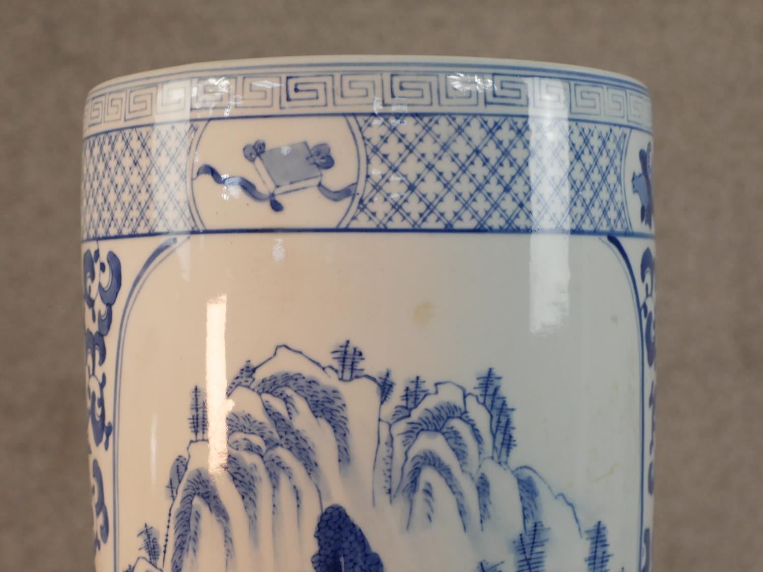 A late 20th century Chinese blue and white porcelain umbrella stand, of cylindrical form decorated - Image 2 of 8