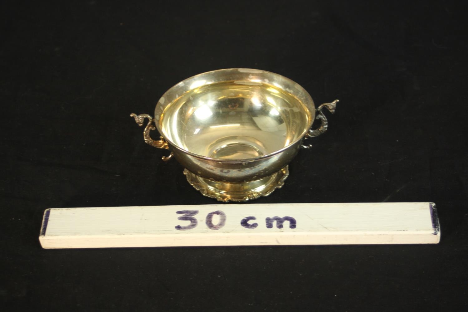 A sterling silver Egyptian twin handled porringer with seahorse form handles on a pedestal foot. - Image 2 of 9