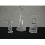 Two cut crystal decanters and a cut crystal vase. etc. H.31 Dia.13cm.