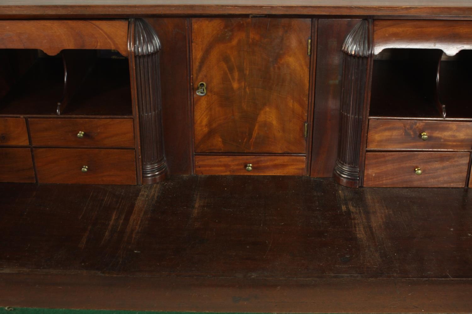 A 19th century mahogany bureau, the fall front enclosing a green writing surface with an arrangement - Image 6 of 12