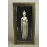 A box framed and glazed carved figure of Buddha painted silver. H.120 W.60 D.12cm.