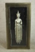 A box framed and glazed carved figure of Buddha painted silver. H.120 W.60 D.12cm.