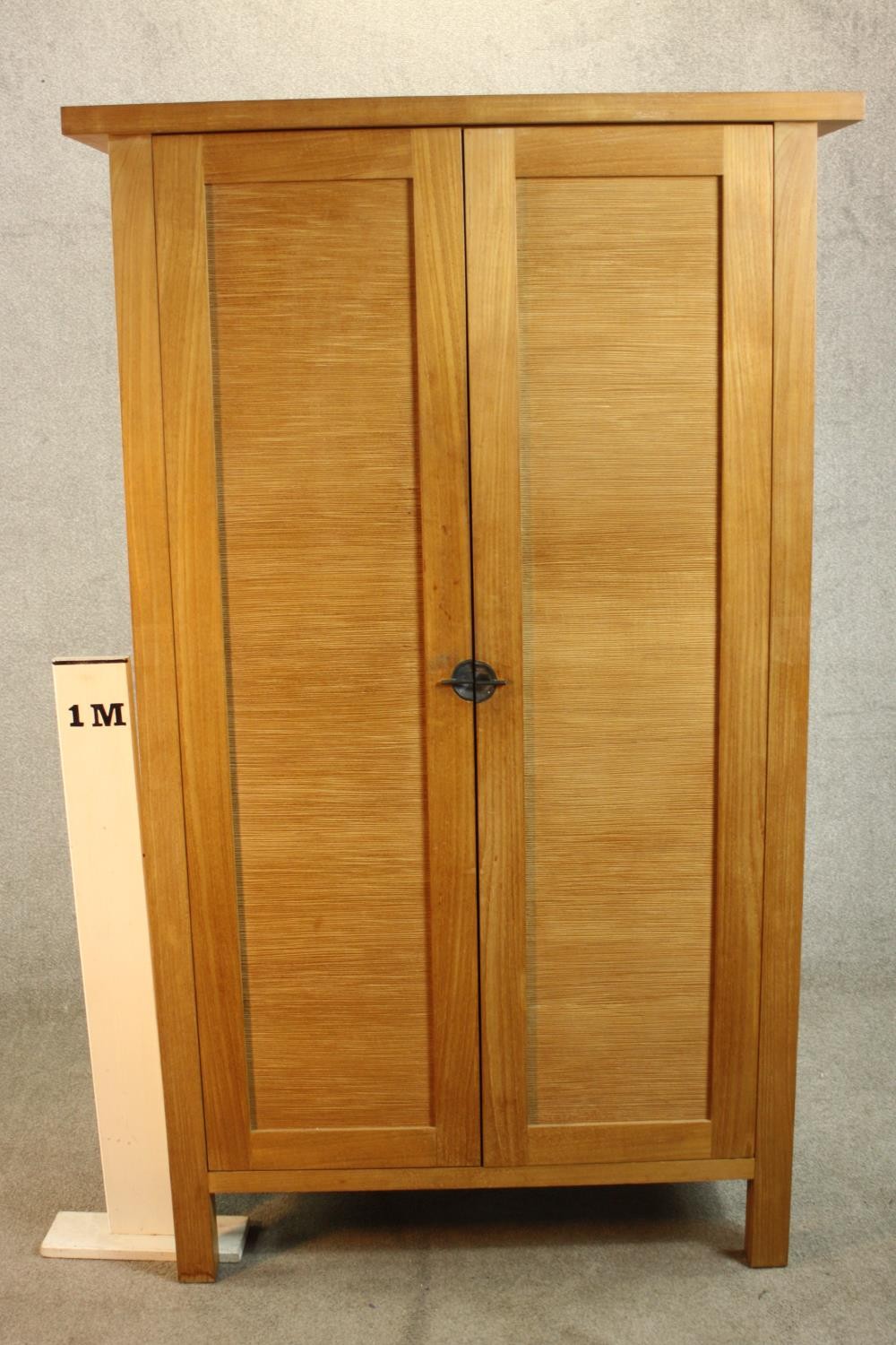 A contemporary hardwood two door floor standing cabinet, enclosing three shelves, on square - Image 2 of 8