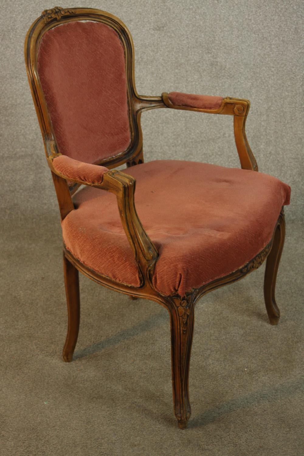 A French Louis XV style fauteuil armchair, upholstered in dark pink fabric on cabriole legs, - Image 7 of 9