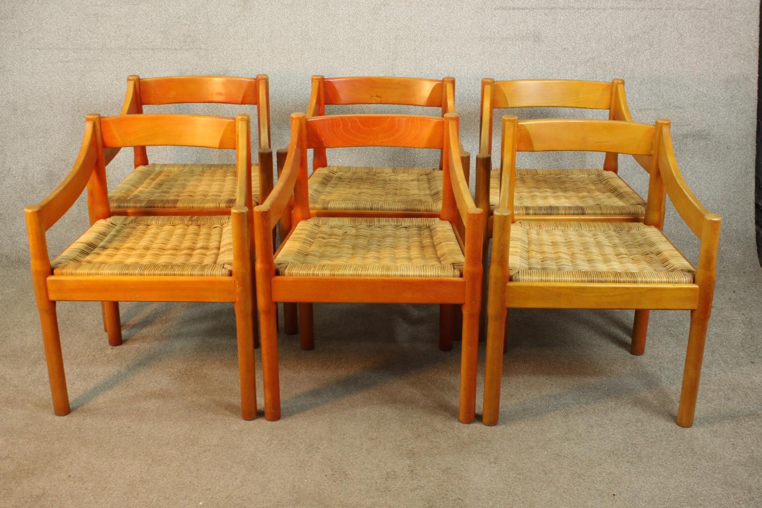 Vico Magistretti for Cassini, Italy, a set of six Carimate red stained beech open armchairs, circa