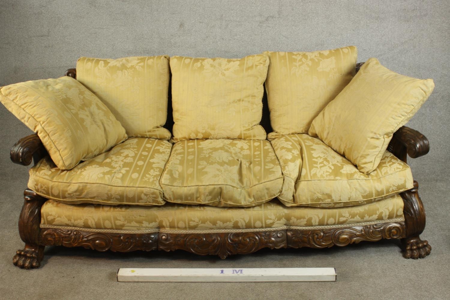 An early 20th century Continental carved walnut three seater bergere sofa, upholstered in gold - Image 2 of 18