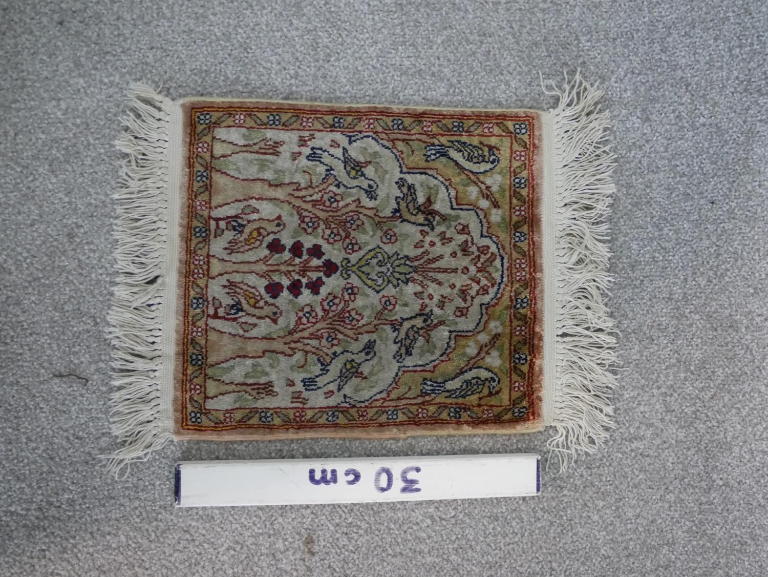 A cream ground hand made Persian silk Kum rug. W.33 D.28cm - Image 2 of 5