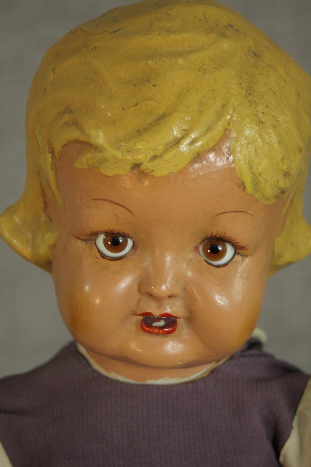 A late 19th century-early 20th century painted papier mache doll with glass eyes and voice box. (not - Image 3 of 9