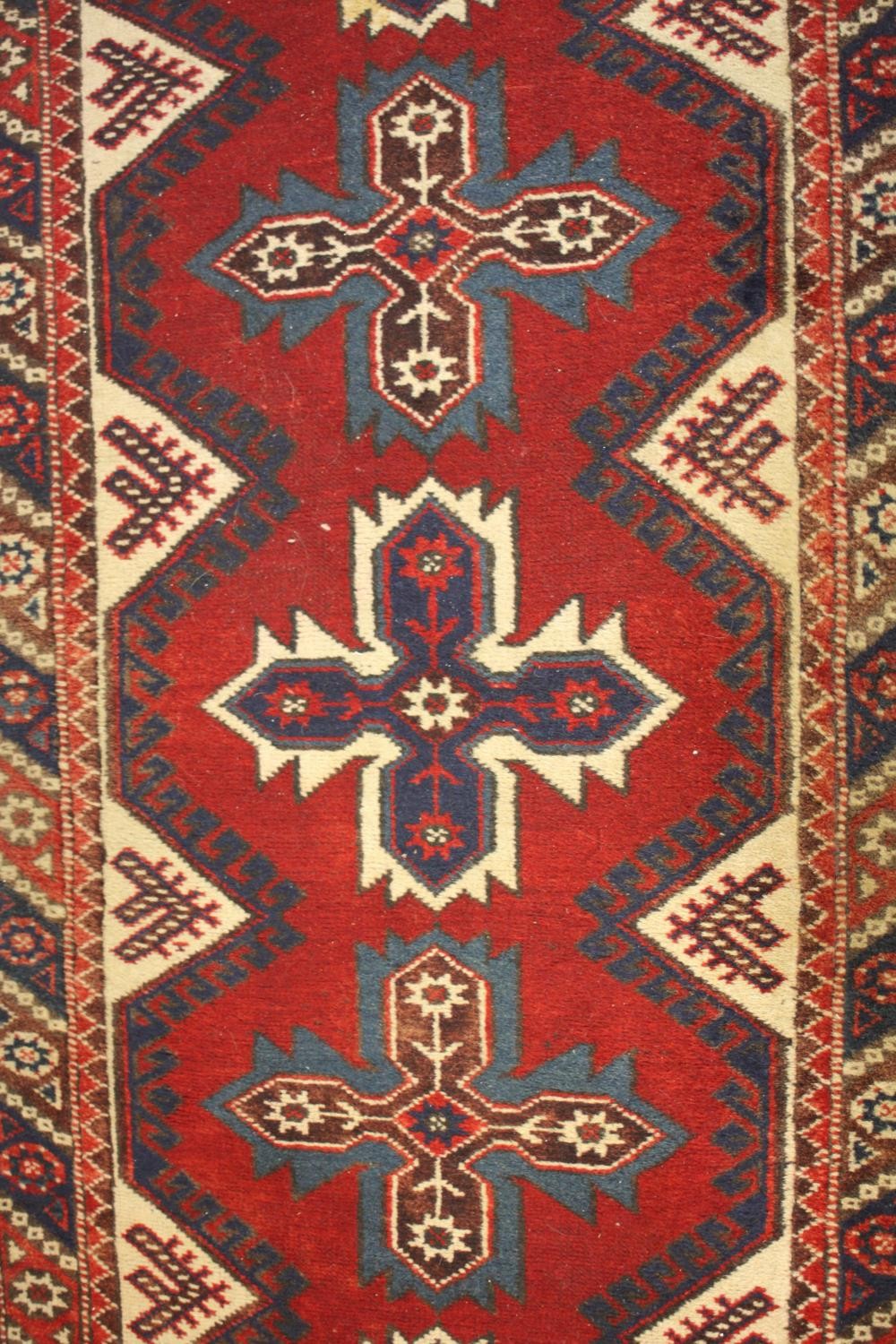 A hand made red ground Turkish Dosemealti runner. L.280 W.77cm - Image 3 of 5