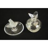 A Lalique pin and ring holder, in the form of a frosted songbird with circular base etched,