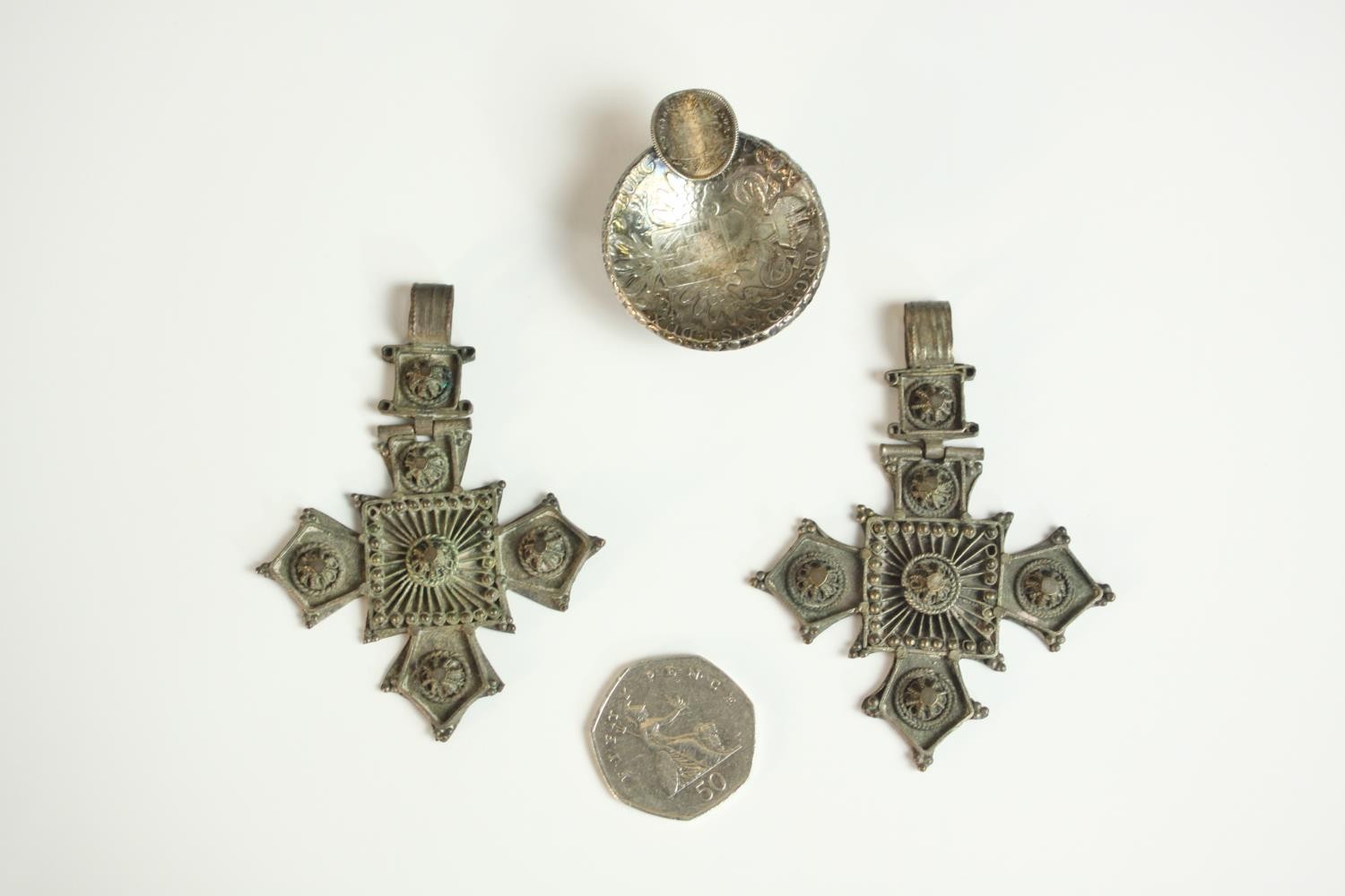 Two silver plated filigree wirework cross pendants along with a novelty miniature silver coin - Image 2 of 9