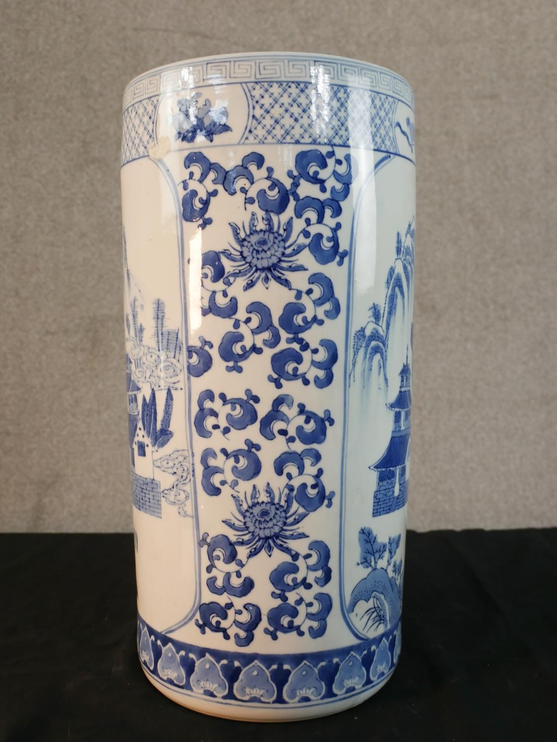 A late 20th century Chinese blue and white porcelain umbrella stand, of cylindrical form decorated - Image 5 of 8