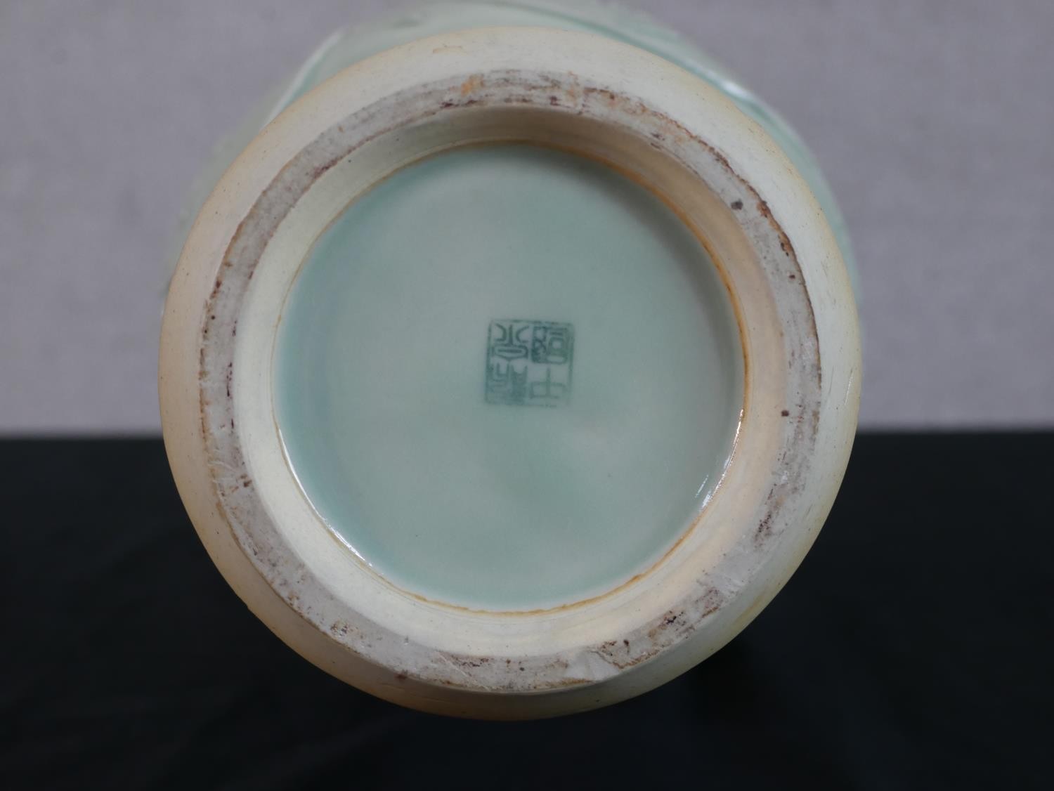 A Chinese celadon glazed porcelain vase, with a flared rim, a slender neck and a bulbous body, - Image 4 of 4