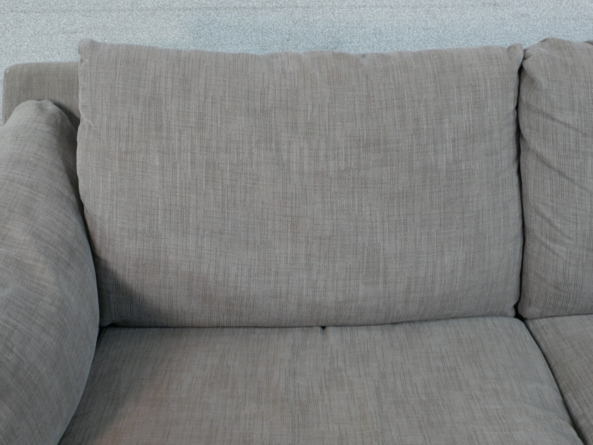 A John Lewis two seater sofa, upholstered in grey fabric, with oak arms and legs. H.77 W.192 D.88cm - Image 7 of 8