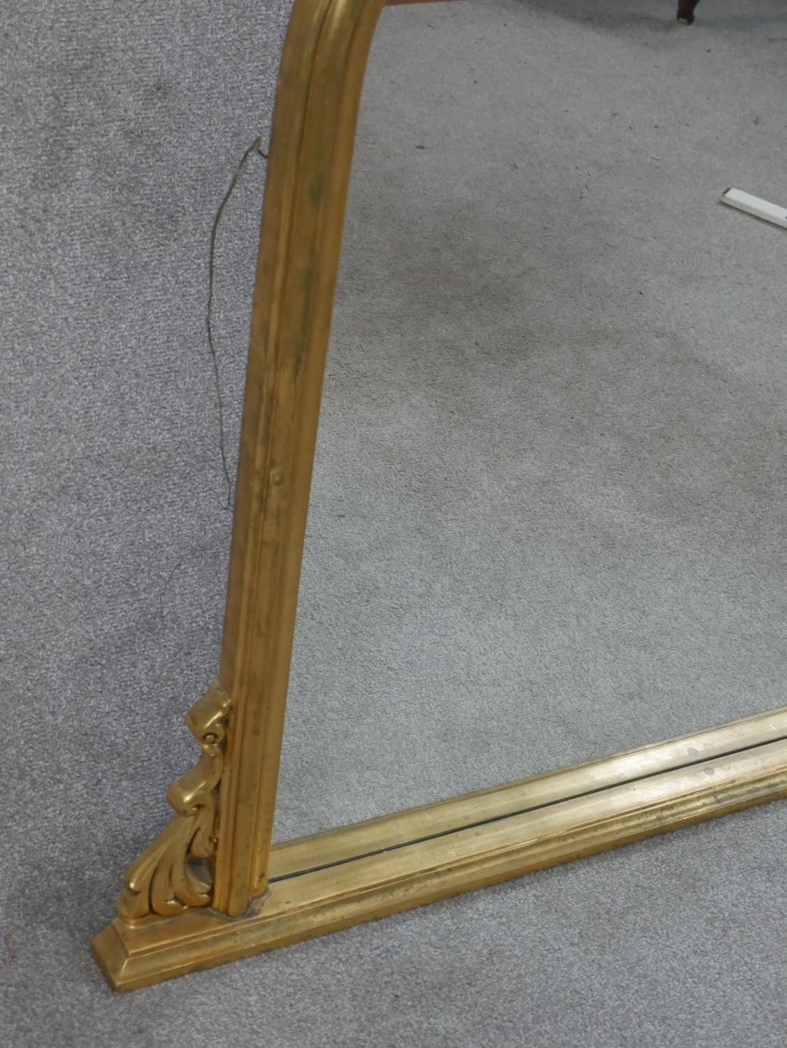 A contemporary Victorian style gilt framed overmantel mirror with a rounded top, flanked by carved - Image 3 of 5